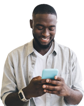 Smiling black man using smartphone.